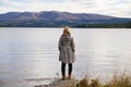 Alone thinking woman standing on a stone Royalty Free Stock Photo