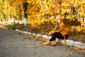 Alone Time, some time to yourself, me time for self-care and self-healing. Alone young woman enjoying life in the autumn