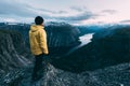 Alone tourist on Trolltunga rock Royalty Free Stock Photo