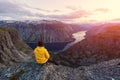 Alone tourist on Trolltunga rock Royalty Free Stock Photo