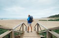 Alone traveler on the ocean beach