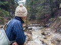 Alone traveler in spring mountain forest