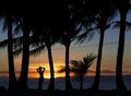 Alone woman enjoying dramatic sunset in Bohol island, Philippines. Woman figure, woman sillouette. Woman near the sea in dramatic