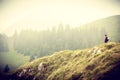 Alone woman in mountains