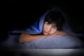 Alone woman sleep on bed with stress at night because sleepless. health problems can not sleep from worry, broken heart, sad, Royalty Free Stock Photo