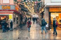 An alone woman standing on Schustergasse in Wurzburg, Germany