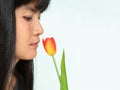 Alone Young Woman Smelling Tulips Flowers Close Up