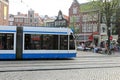 along the public tramway to the large Amsterdam square
