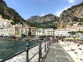 Amalfi Town, Italy - 8-8-2019 - Along the shoreline of the Amalfi Coast with views of the town, and the mountains