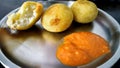 Aloo bonda or aloo pakora served with sauce