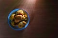 Aloo bonda in a plate on a wooden background