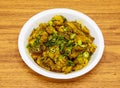 aloo gobhi served in plate isolated on table top view of indian and pakistani spicy food