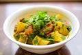 aloo gobhi with turmeric and coriander leaves Royalty Free Stock Photo