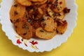 Aloo Katli or Potato Katli is an excellent and tasty asian dish, slices of fried potatoes, sauces and herbs, snack or starter Royalty Free Stock Photo
