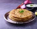 Aloo Paratha- Indian Flatbread Stuffed with Spiced Potatoes. Concept Indian Cuisine, Vegetar