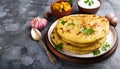 Aloo Paratha- Indian Flatbread Stuffed with Spiced Potatoes. Concept Indian Cuisine, Vegetar
