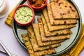 Aloo Paratha / Indian Potato stuffed Flatbread. Served with fresh fresh Lassi / Lassie or buttermilk Royalty Free Stock Photo