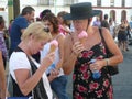 Two expats enjoying icecream at local fiesta