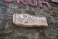 View of Alpe Grum train station sign