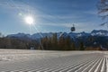 Dolomites, ski area with beautiful slopes and blue sky. Empty ski slope in winter on a sunny day. Prepare ski slope, Alpe di Lusia Royalty Free Stock Photo