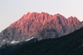 Alpen glow across a mountain range in bavaria