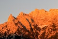 Alpen glow across a mountain range in bavaria