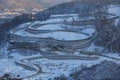 Alpencia, South Korea, 2016, winter - General plan. Aerial view of a winter bobsleigh track in the Olympic village of Alpencia.