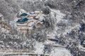 Alpencia, South Korea, 2016, Winter - Top View. Buddhist monastery in the middle of a snowy forest in the winter taiga