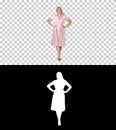 Woman in dress with hands on hips walking while looking at camera, Alpha Channel Royalty Free Stock Photo