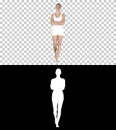 Smiling sports woman walking with arms folded and looking at camera, Alpha Channel Royalty Free Stock Photo