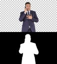 Successful man in suit speaks on phone and walks, Alpha Channel Royalty Free Stock Photo