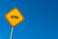 Alpha - yellow sign with blue sky
