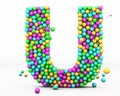 Alphabet balls multi-colored, kids font 3d render. Letter U. Isolated on white