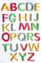 Alphabet in decorated colourful cookies Royalty Free Stock Photo