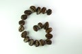 Alphabet G form Coffee beans in white background Royalty Free Stock Photo