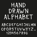 Alphabet. Hand drawn letters and numbers isolated on black background. Vector illustration. Royalty Free Stock Photo