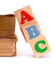 Alphabet letter ABC blocks for kids and old books Royalty Free Stock Photo