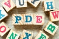 Alphabet block in word PDE abbreviation of permitted daily exposure, partial differential equation or personal development