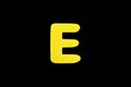 Alphabet letter E symbol of sponge rubber isolated over black background