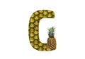 Alphabet letter G made from pineapple on a white background. Tropical fruit pineapple diet summer food