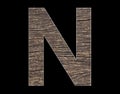 Alphabet letter N - Rustic tree bark background Royalty Free Stock Photo