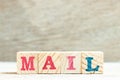 Alphabet in word mail on wood background