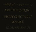 Alphabet letters lowercase, uppercase and numbers gold on black. Royalty Free Stock Photo