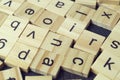 Alphabet letters on wooden scrabble pieces Royalty Free Stock Photo