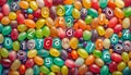 Alphabet with numbers, made with photo of brightly coloured jelly bean sweets as the background Royalty Free Stock Photo