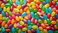 Alphabet with numbers, made with photo of brightly coloured jelly bean sweets as the background Royalty Free Stock Photo