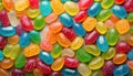 Alphabet with numbers, made with photo of brightly coloured jelly bean sweets as the background Royalty Free Stock Photo