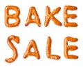 Alphabet pretzel written words BAKE SALE isolated