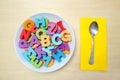 Alphabet Soup bright wood letters in a bowl Royalty Free Stock Photo