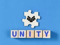 Alphabets UNITY on wooden cubes